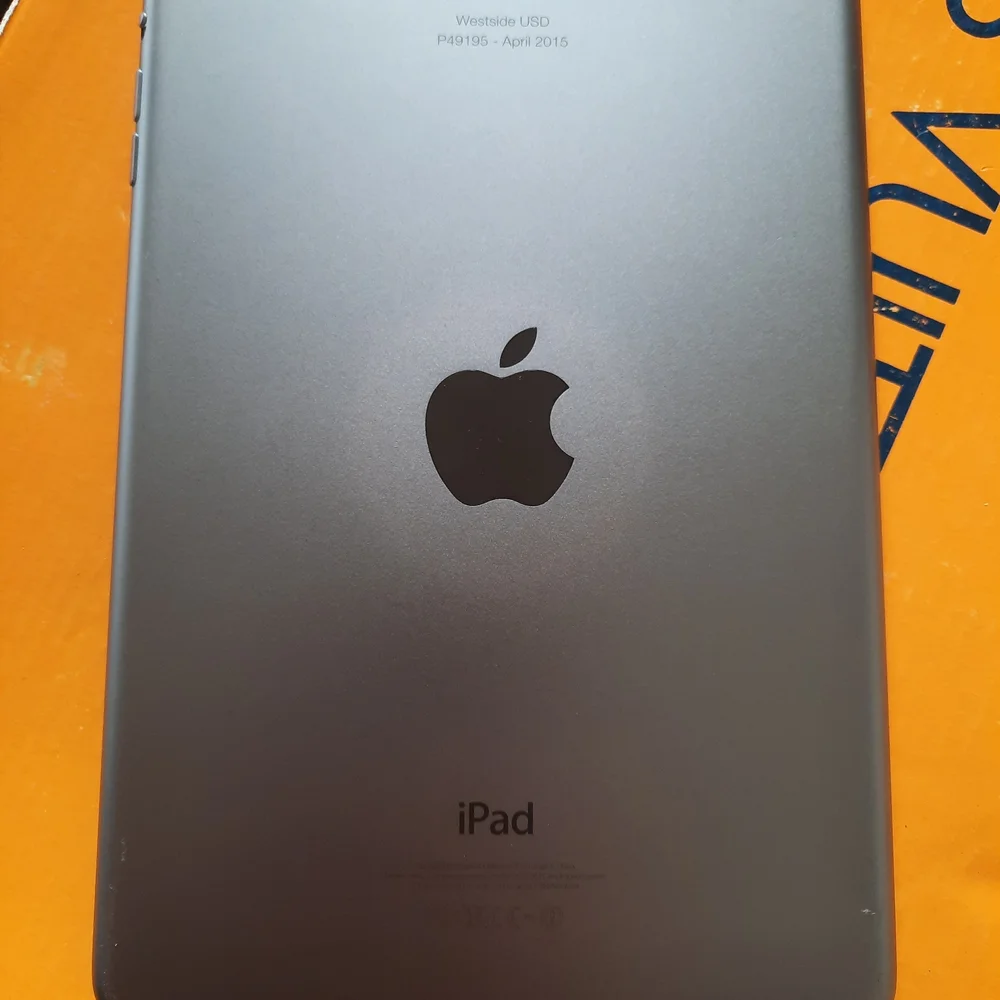 Apple iPad Mini AIR in Black with Blue-Green Home Screen Wallpaper